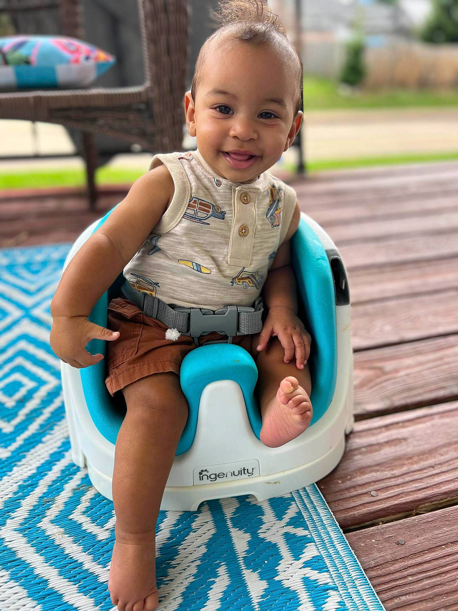 Kamari is registered to the contest to win money with this photo: baby, baby_products, baby_toddler_clothing, barefoot, blue, child, comfort, electric_blue, face, fun, grass, happy, head, joy, leisure, person, recreation, sitting, skin, smile