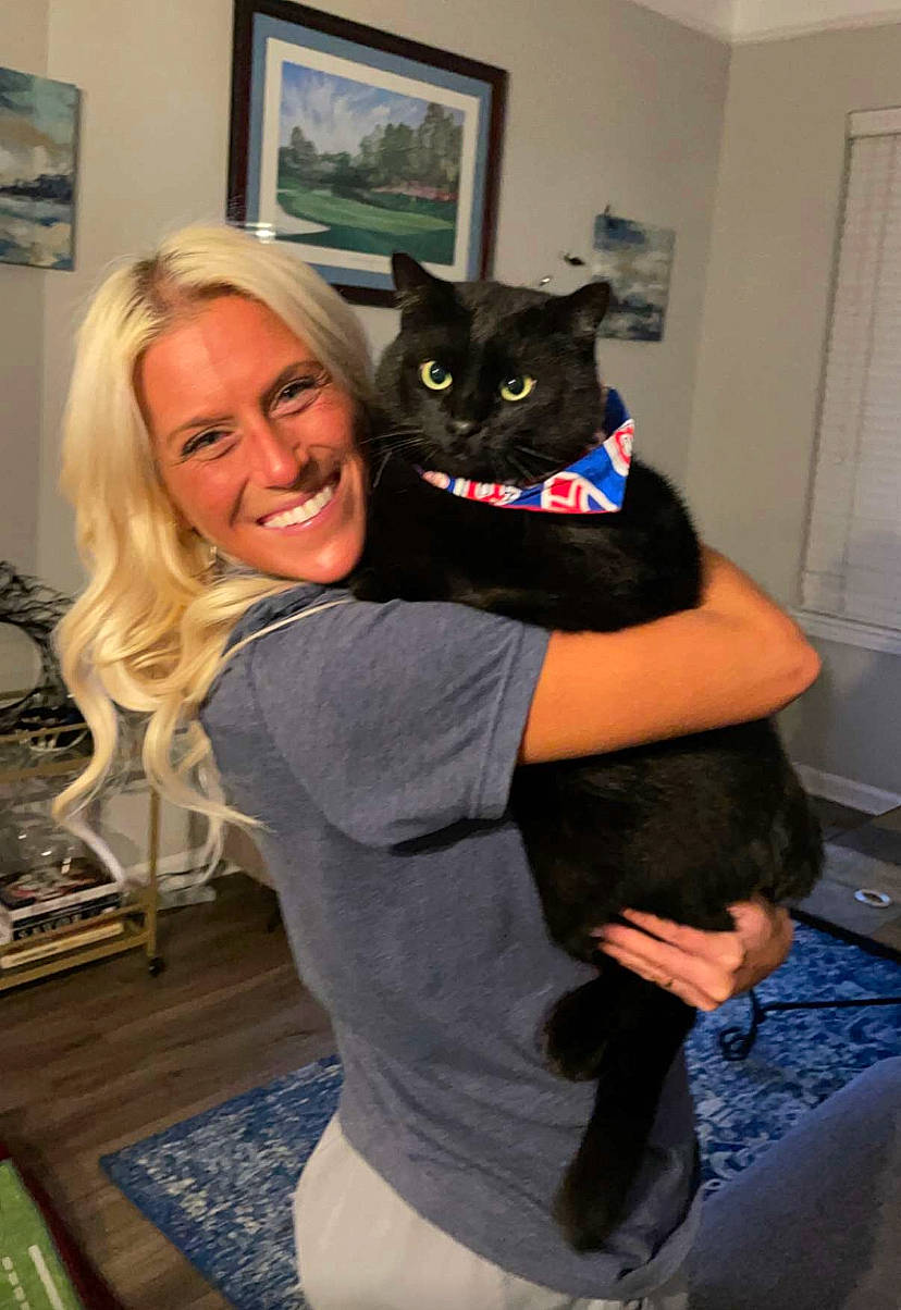 Bama joined the competition — help win amazing prizes! black_cat, carnivore, cat, chair, domestic_short_haired_cat, event, felidae, formal_wear, fun, fur, gesture, grey, picture_frame, room, sitting, small_to_medium_sized_cats, smile, t_shirt, tail, whiskers