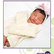 Kalani is registered to the contest to win money with this photo: adorable, baby, baby_clothes, child, closeup, cozy, cute, headband, infant, knitted_sweater, laying_down, newborn, peaceful, pink_bow, portrait, resting, sleeping, soft_texture, white_background, wrapped