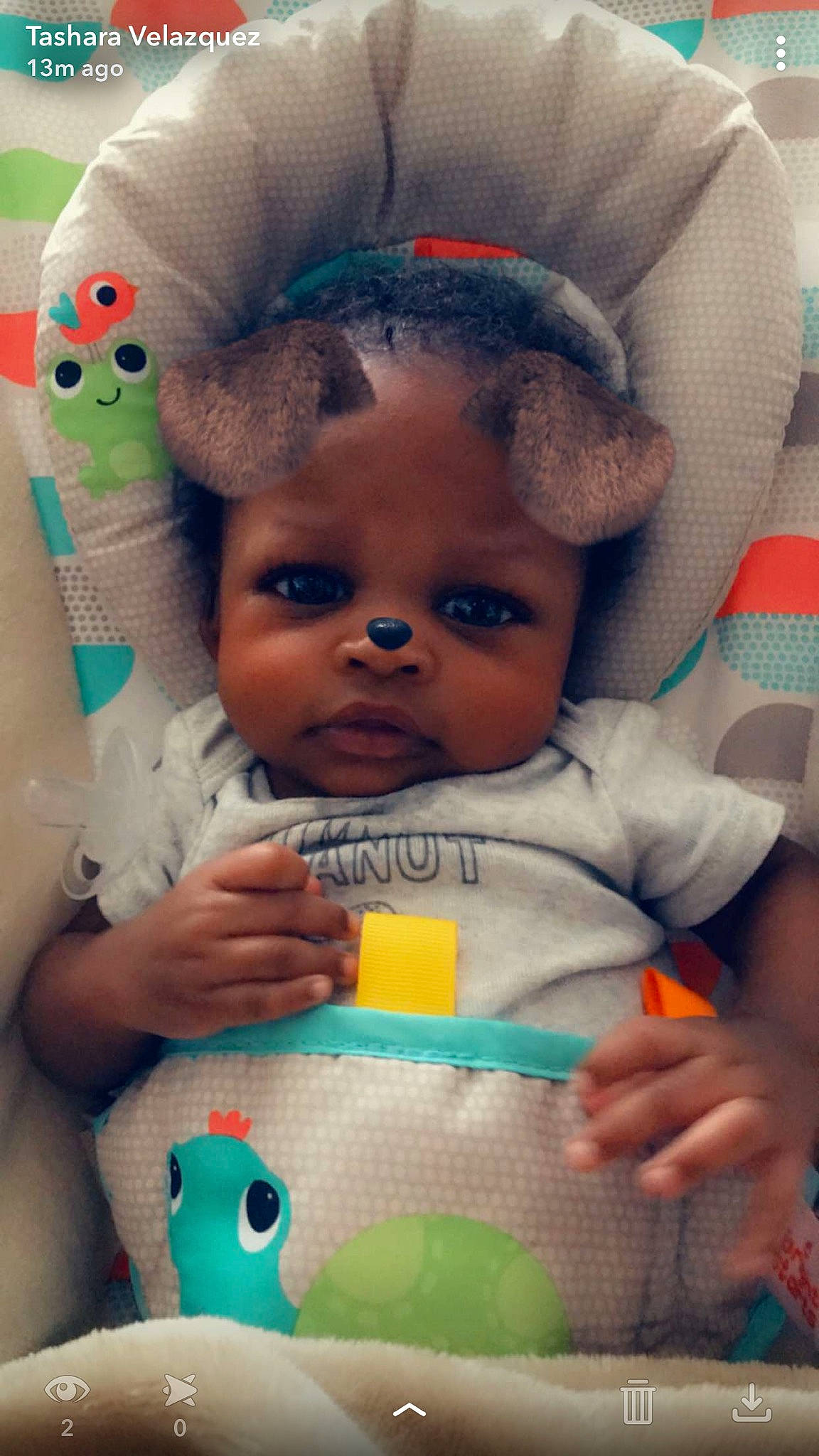 Khari is registered to the contest to win money with this photo: baby, baby_toys, cheek, child, ear, eye, green, head, nose, person, play, plush, product, skin, stuffed_toy, toddler, toy, yellow