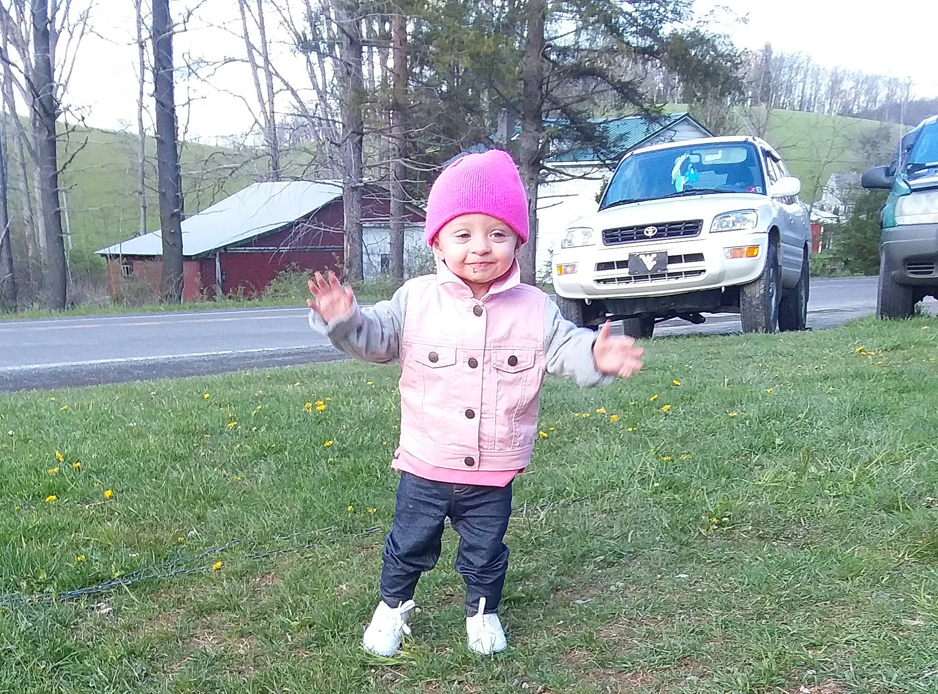 Braeley Rose is registered to the contest to win money with this photo: car, child, city_car, family_car, grass, headwear, joy, minivan, person, tree, vehicle, vehicle_door