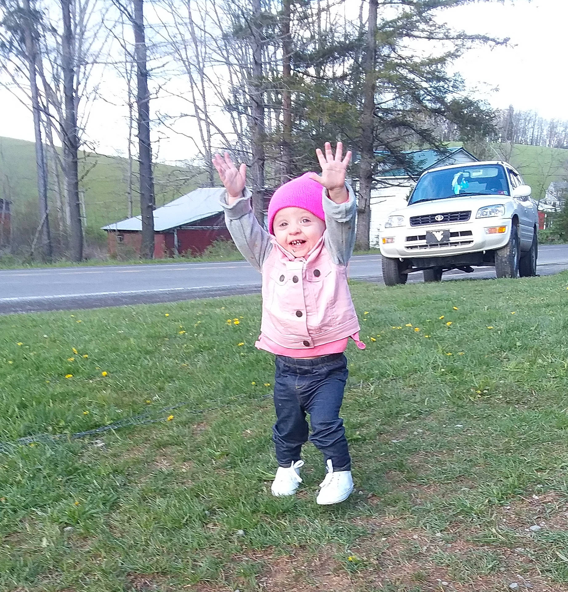 Braeley Rose is registered to the contest to win money with this photo: car, child, city_car, family_car, grass, headwear, minivan, person, pink, plant, recreation, subcompact_car, tree, vacation, vehicle, winter