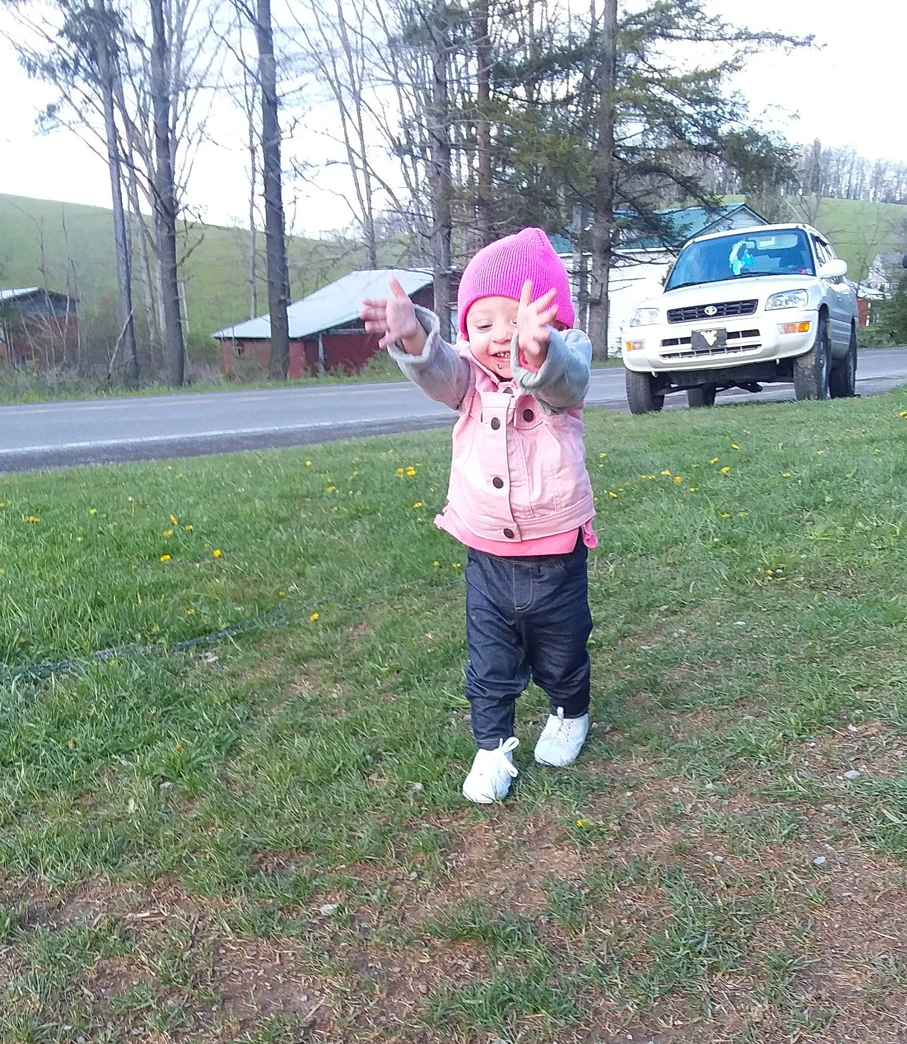 Braeley Rose is registered to the contest to win money with this photo: car, child, city_car, family_car, grass, headwear, minivan, person, pink, plant, recreation, toddler, tree, vacation, vehicle, walking