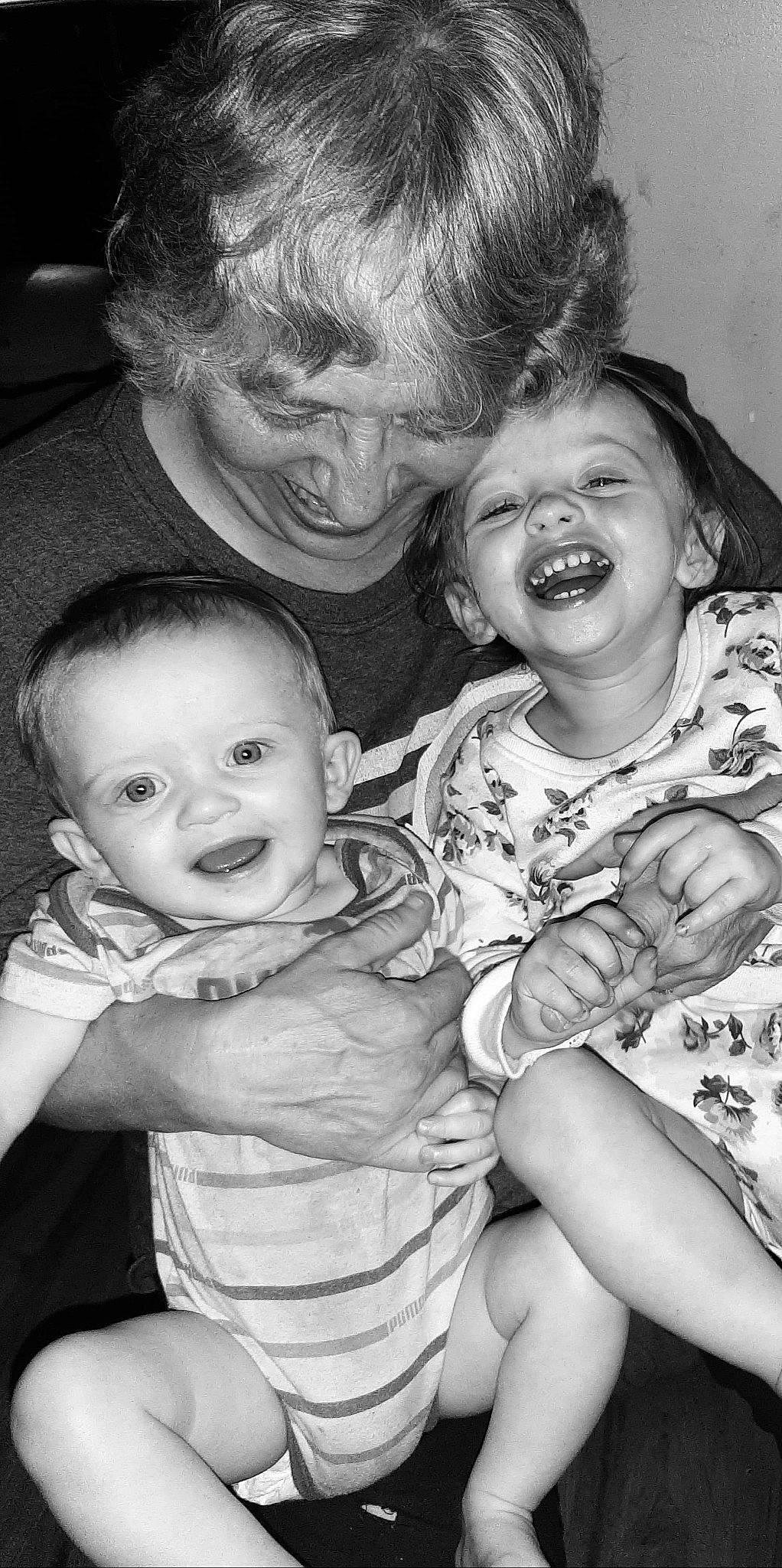 Braeley Rose joined the competition — help win amazing prizes! baby, black_and_white, child, facial_expression, family, fun, happy, hug, iris, laugh, monochrome, monochrome_photography, people, person, photograph, photography, sibling, sitting, smile, snapshot
