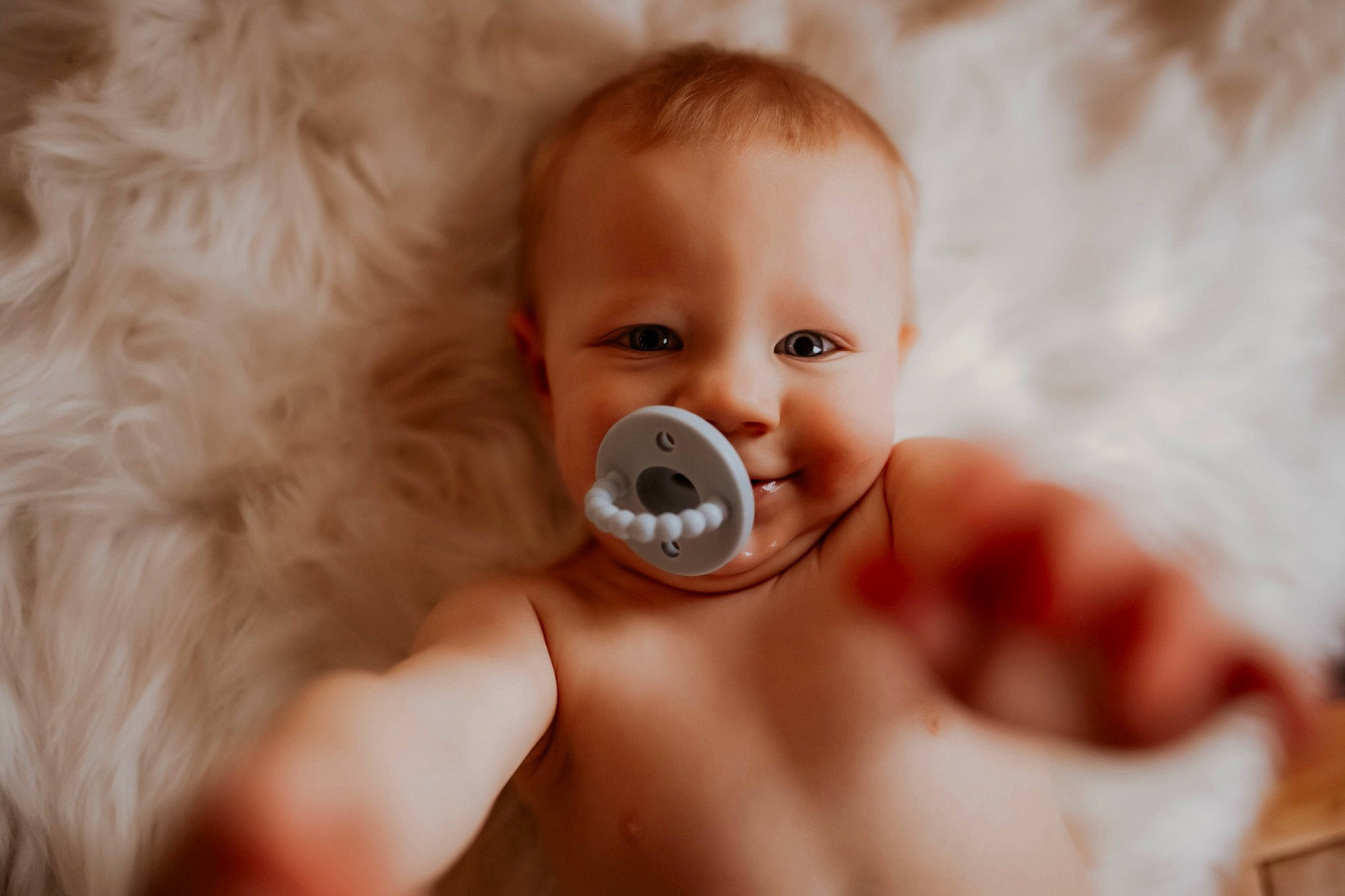 Andrei is registered to the contest to win money with this photo: baby, cameras_optics, cheek, child, close_up, ear, eye, eyebrow, eyelash, finger, gesture, hand, happy, iris, lip, mouth, nail, nose, person, skin