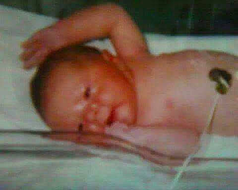 Haylee is registered to the contest to win money with this photo: abdomen, baby, barechested, bathing, cheek, chest, child, comfort, eye, eyebrow, eyelash, flesh, fluid, human_body, jaw, navel, person, temperature, thumb, toddler