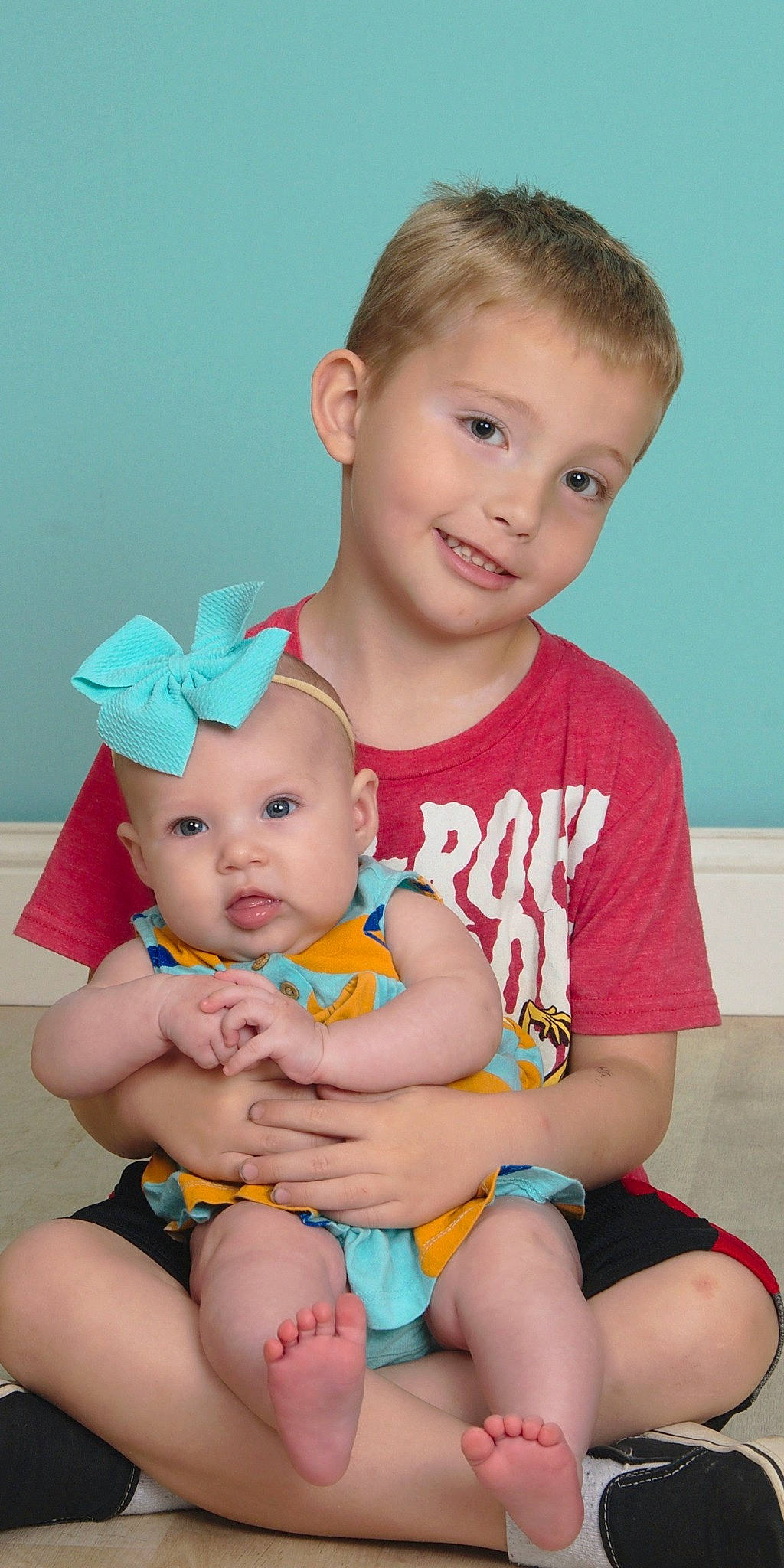 Ian joined the competition — help win amazing prizes! baby, baby_toddler_clothing, cheek, chin, eye, face, finger, happy, headwear, human_body, iris, joy, muscle, organ, person, pink, red, skin, smile, standing