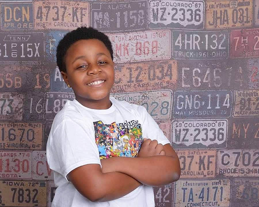 Delorian is registered to the contest to win money with this photo: child, forehead, joy, person, smile