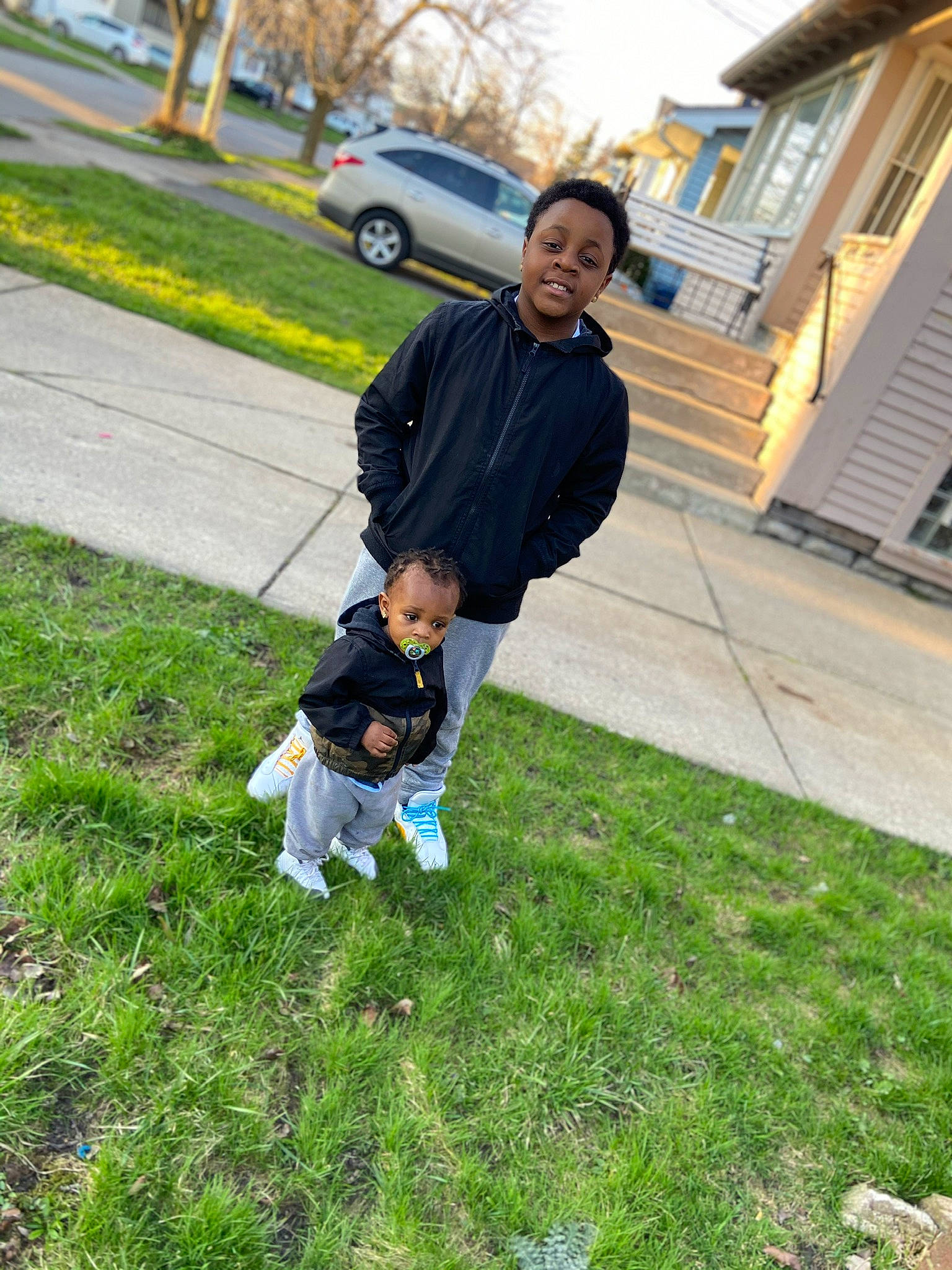 Gregory is registered to the contest to win money with this photo: canidae, child, fun, grass, home, house, joy, lawn, leaf, person, plant, play, recreation, toddler, tree, vacation, walking, yard