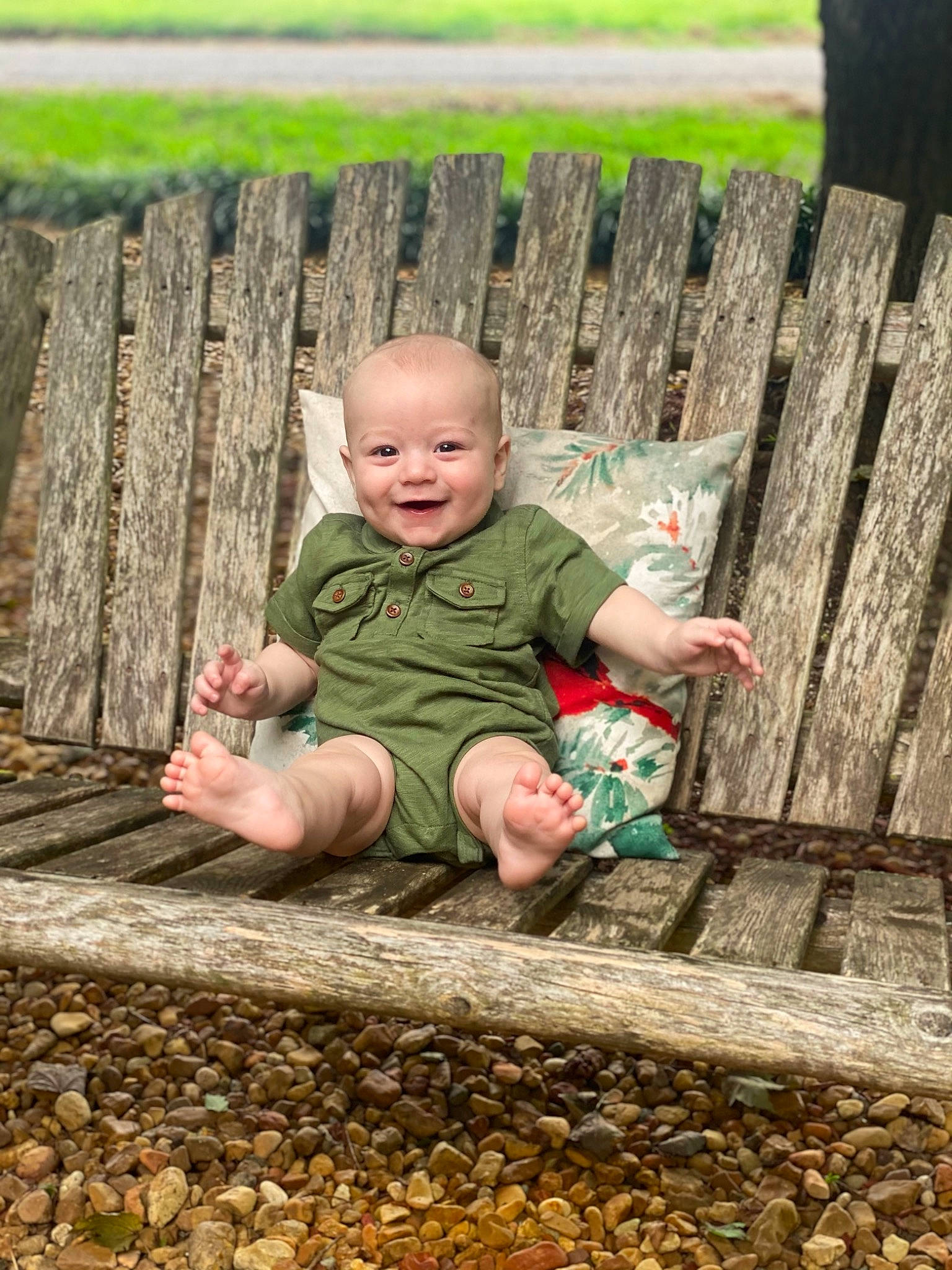 River is registered to the contest to win money with this photo: baby, botany, child, flooring, fun, grass, happy, human_body, joy, leaf, leisure, mammal, natural_environment, people_in_nature, person, plant, recreation, sitting, summer, toddler