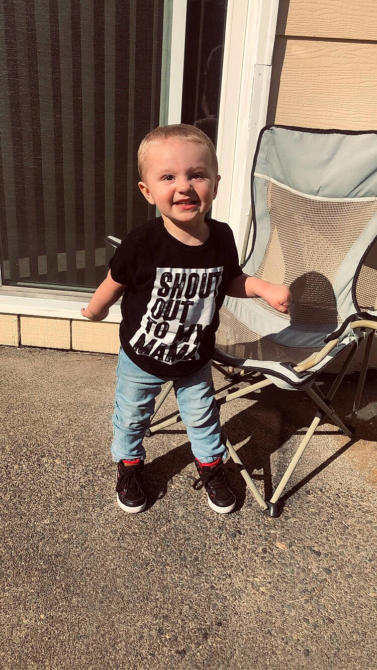 Kalvin is registered to the contest to win money with this photo: child, cool, footwear, fun, jeans, joy, leg, person, play, product, shoe, smile, standing, t_shirt, toddler