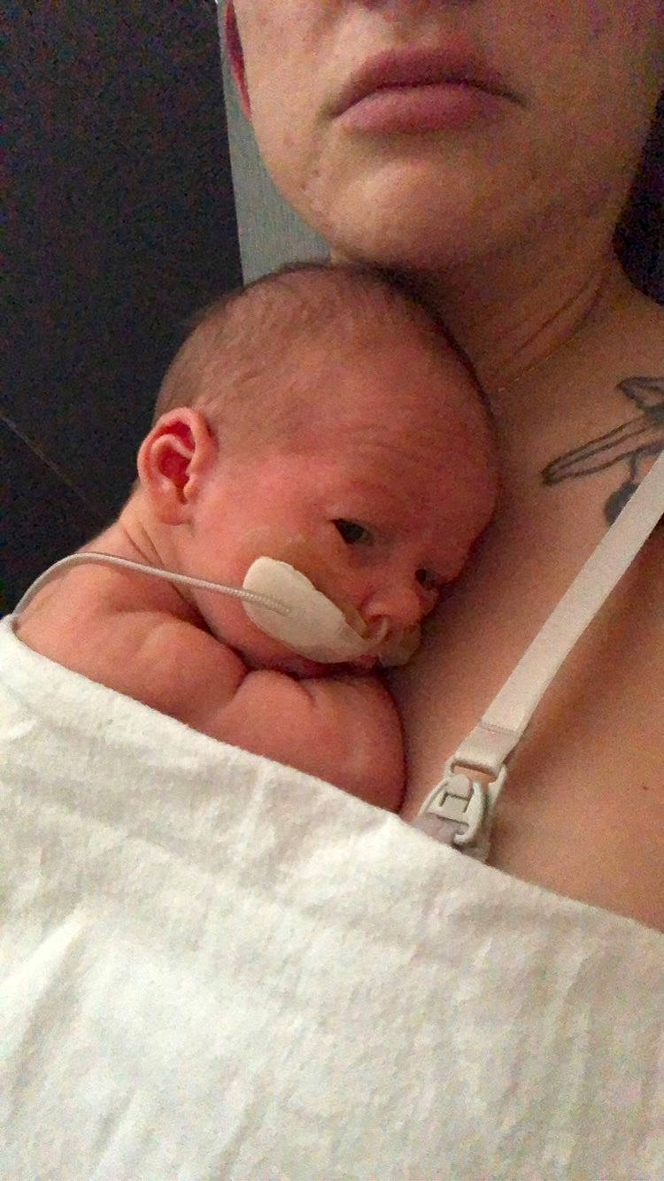 Ewan is registered to the contest to win money with this photo: abdomen, arm, baby, cheek, chest, comfort, ear, eyelash, finger, gesture, hair, happy, human_body, lip, mouth, neck, nose, person, skin, stomach