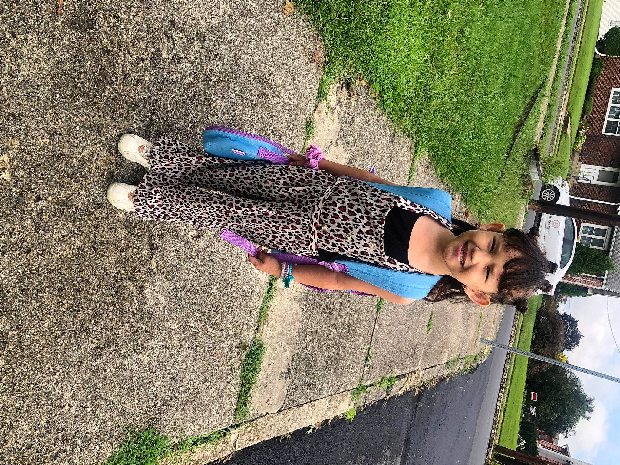 Annabelle joined the competition — help win amazing prizes! asphalt, electric_blue, fun, grass, human_leg, joy, leisure, magenta, pattern, people_in_nature, person, plant, recreation, road_surface, shadow, shrub, smile, soil, travel, tree