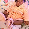 Madisyn joined the competition — help win amazing prizes! baby, sleeping, robe, slippers, baby_chair, pattern, strawberry, bear, soft, cozy, child, indoor, infant, cute, peaceful, resting, clothing, person, comfort, portrait