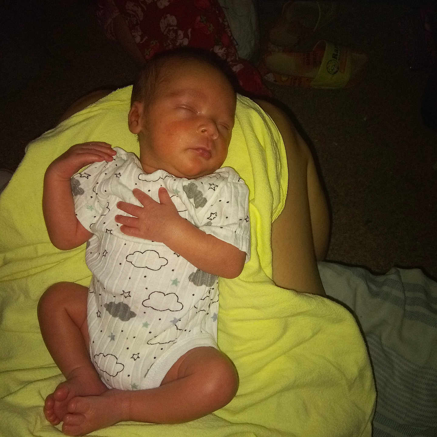 Jefphon is registered to the contest to win money with this photo: baby, blanket, child, cloud_pattern, cozy, foot, hand, indoor, infant, legs, newborn, nighttime, onesie, peaceful, person, resting, skin, sleeping, soft, yellow_blanket
