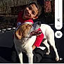 boy, dog, smiling, outdoor, sunlight, trees, pet, happy, hugging, playing, animal, child, casual_clothing, nature, friendship, joy, daytime, mammal, fun, trampoline