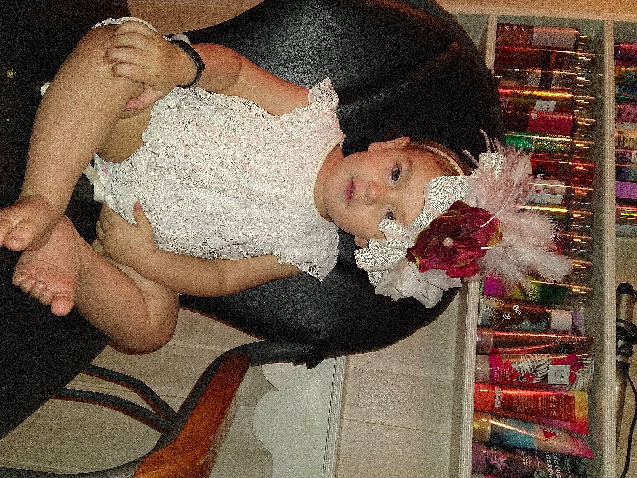 Emma'Lee joined the competition — help win amazing prizes! abdomen, black_hair, chest, dress, elbow, eyelash, flash_photography, happy, headwear, human_leg, knee, lap, long_hair, person, shelf, shelving, shoulder, textile, thigh, toy