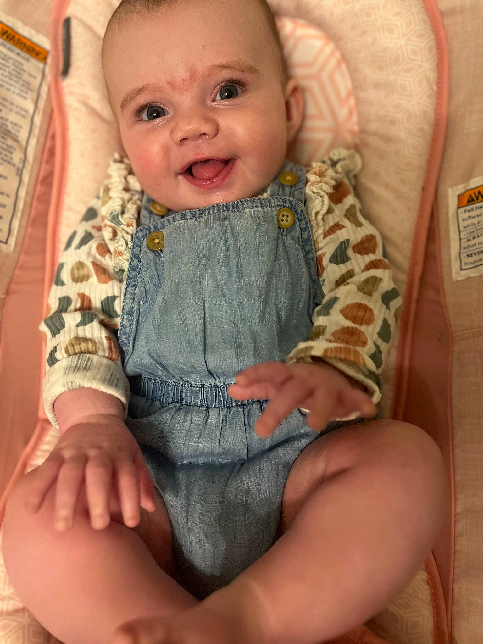 Nevaeh is registered to the contest to win money with this photo: arm, baby, baby_toddler_clothing, cheek, child, comfort, eye, face, finger, happy, head, human_body, iris, neck, pattern, person, skin, sleeve, smile, thigh