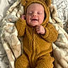 adorable, baby, bear_costume, blanket, child, costume, cozy, cute, face, fuzzy_clothing, happy, indoors, infant, lying_down, newborn, portrait, sleeping, smiling, soft_texture, warm_clothing
