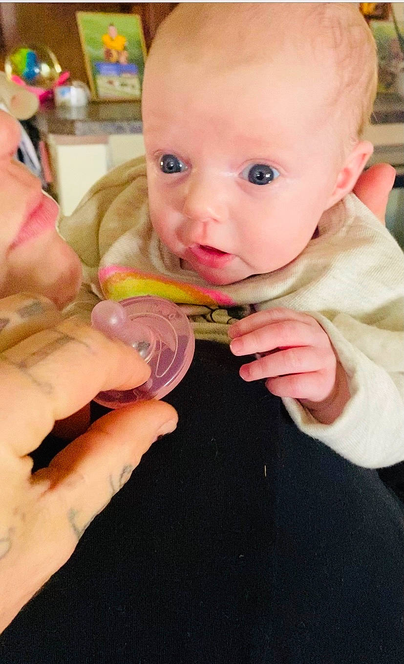 Ryah joined the competition — help win amazing prizes! baby, baby_grabbing_for_something, baby_toddler_clothing, biting, cheek, drinkware, eyelash, finger, gesture, hand, happy, head, iris, lip, mouth, nail, nose, person, skin, thumb