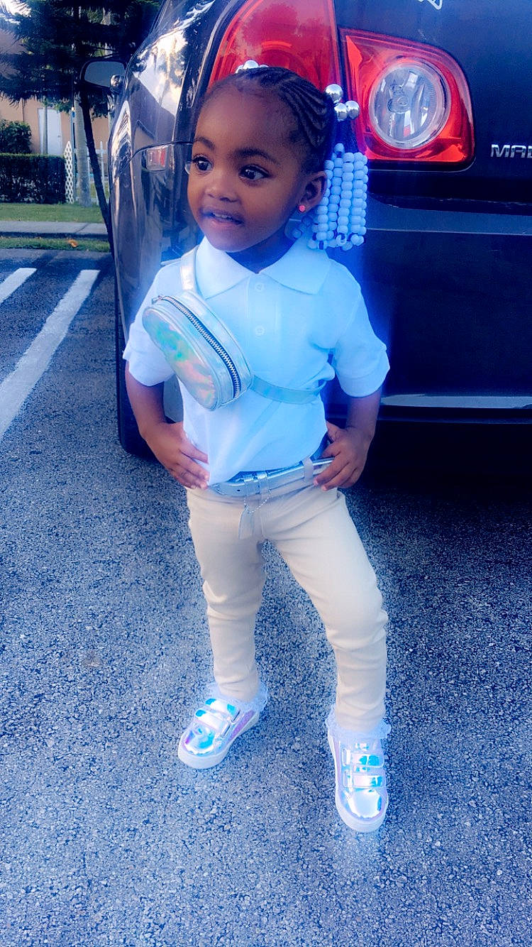 Alani joined the competition — help win amazing prizes! baby, blue, car, child, cool, denim, electric_blue, footwear, fun, jeans, outerwear, people, person, pink, skin, smile, standing, t_shirt, toddler, vacation