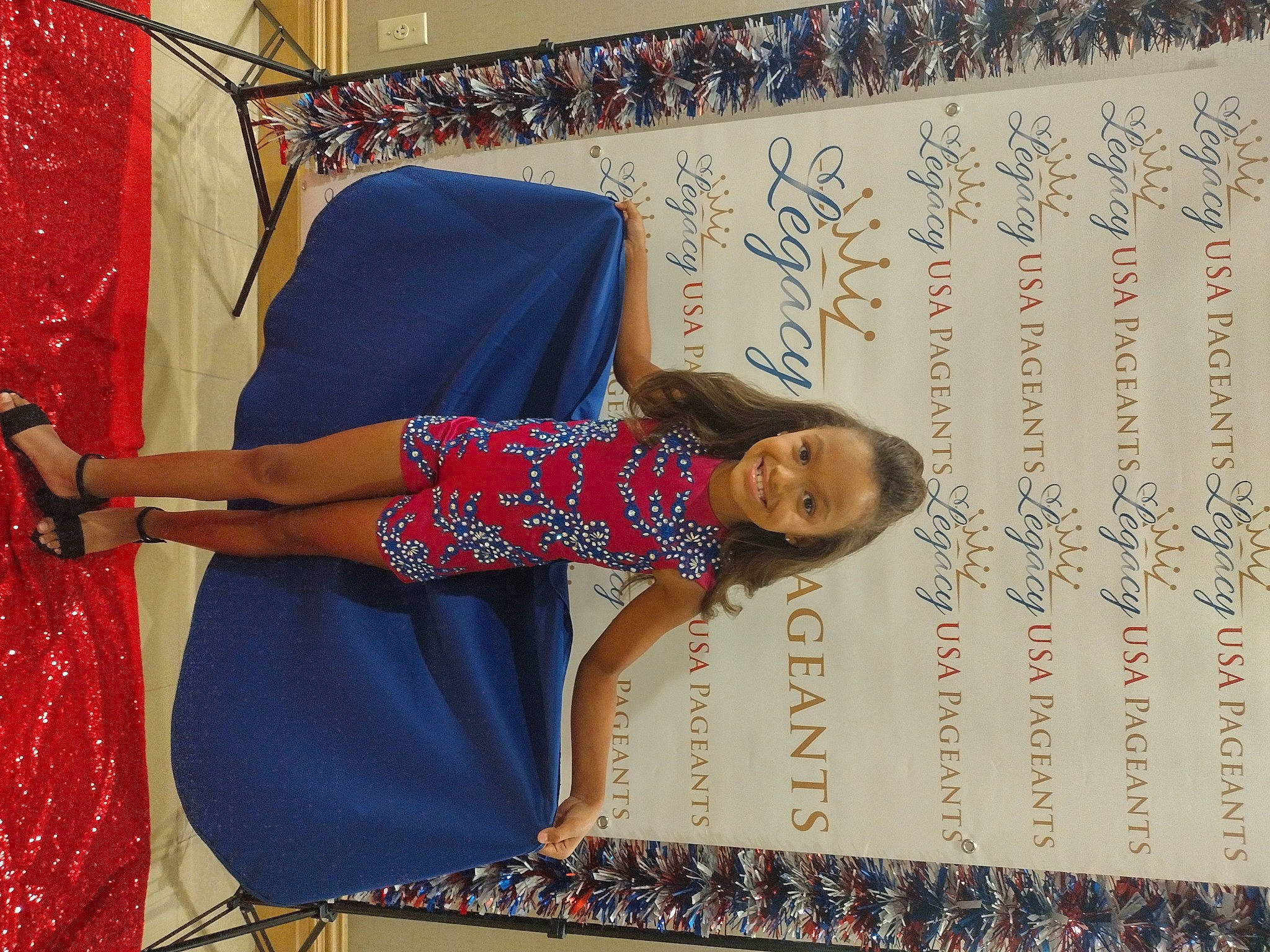 Olivia joined the competition — help win amazing prizes! beauty, day_dress, design, electric_blue, event, fashion_design, flooring, font, handwriting, happy, human, human_leg, joint, joy, magenta, one_piece_garment, pattern, person, sandal, sunglasses