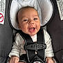baby, car_seat, child, closeup, clothing, cute, expression, face, hands, happy, head, indoor, infant, newborn, person, safety_harness, seat, seatbelt, skin, smiling