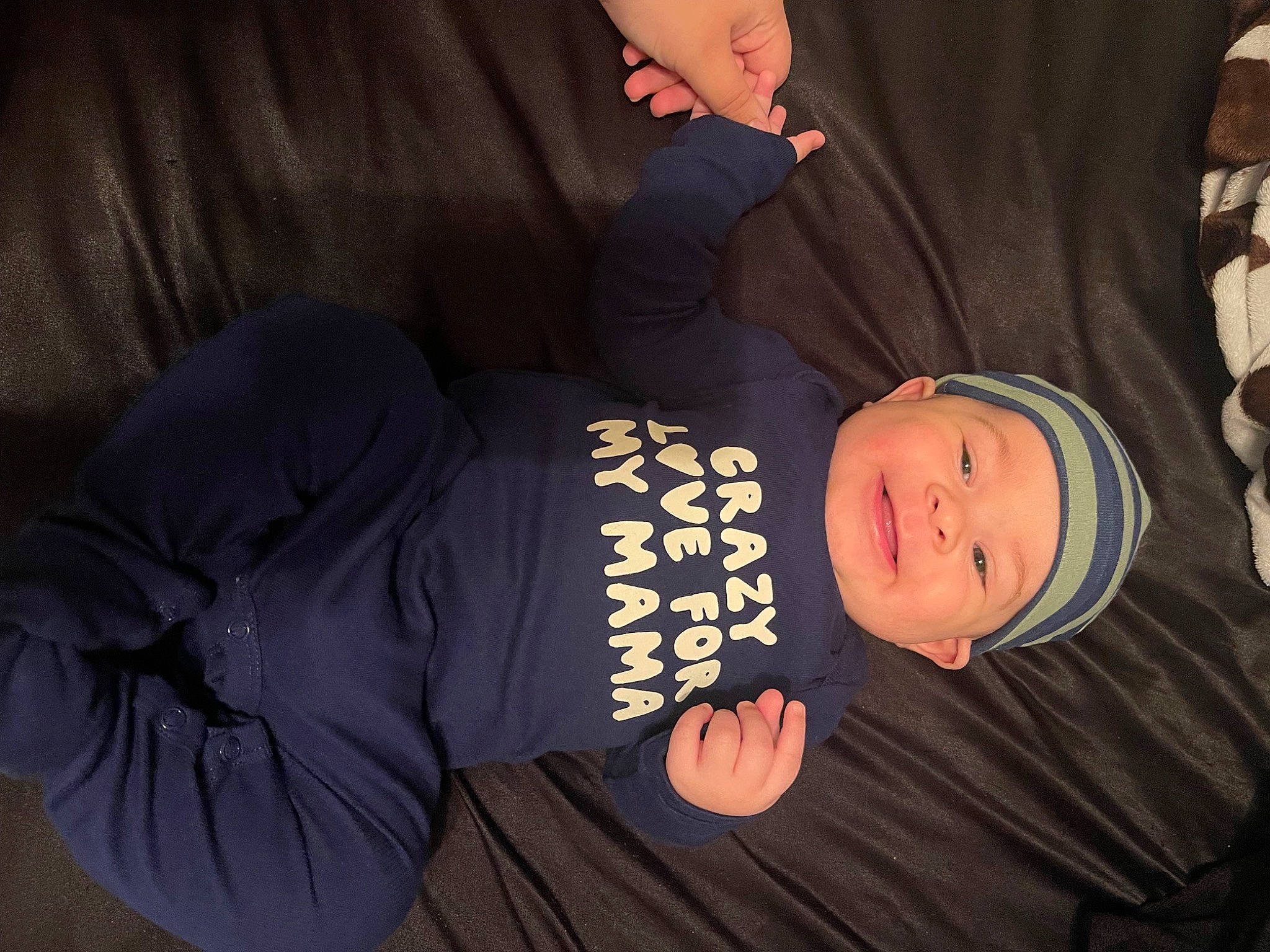 Brentlyn joined the competition — help win amazing prizes! baby, baby_toddler_clothing, cheek, child, comfort, elbow, fun, happy, headgear, headwear, human_body, person, room, sitting, sleeve, smile, toddler, tree