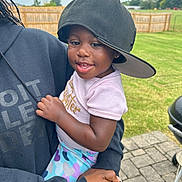 Carly joined the competition — help win amazing prizes! baby, backyard, baseballcap, cap, clothing, face, fence, grass, hat, head, nature, outdoors, pants, park, person, photography, plant, portrait, t_shirt, yard