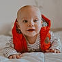 Lío participe au concours pour gagner de l'argent avec cette photo : baby, bed, child, clothing, cute, eyes, face, hands, happy, head, indoors, infant, mouth, portrait, red_vest, smiling, soft_light, striped_shirt, white_bedspread, young