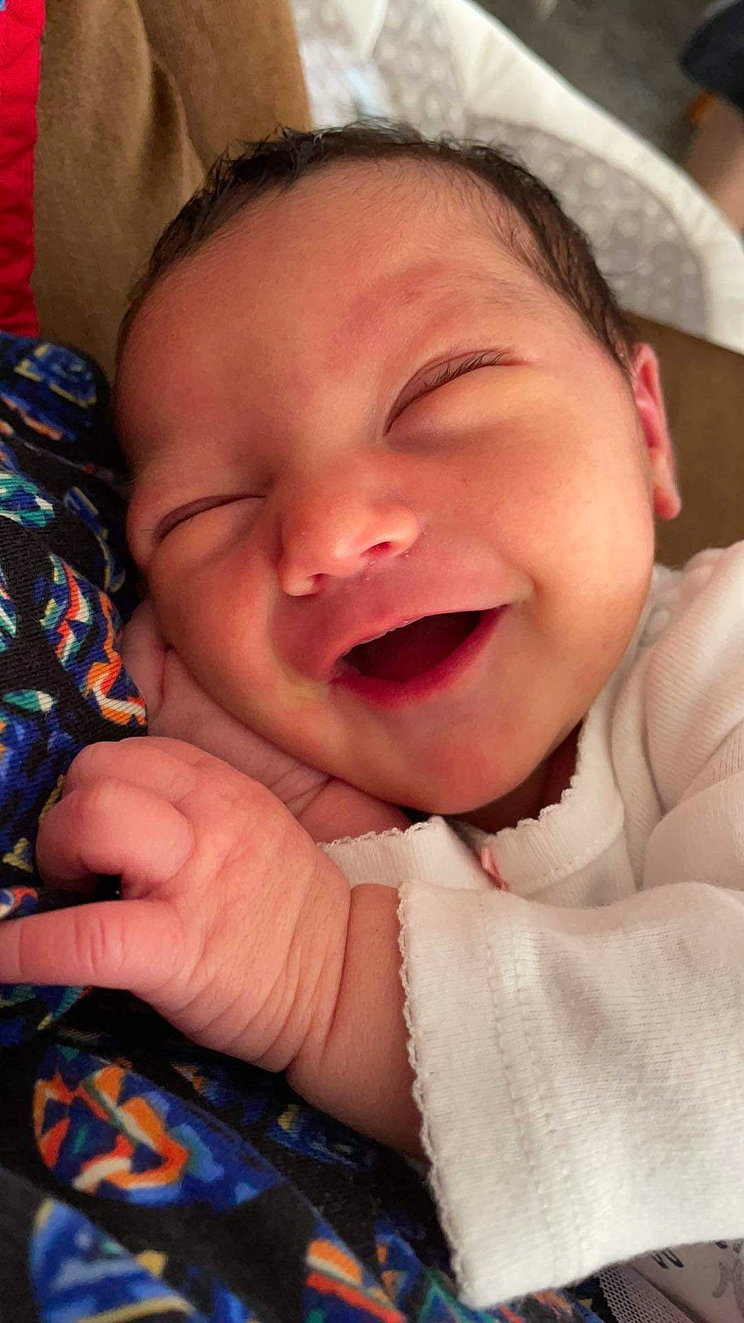 Hazel-grace is registered to the contest to win money with this photo: baby, baby_toddler_clothing, cheek, chin, comfort, facial_expression, finger, gesture, happy, headgear, iris, lip, mouth, nose, person, pink, product, skin, smile, toddler