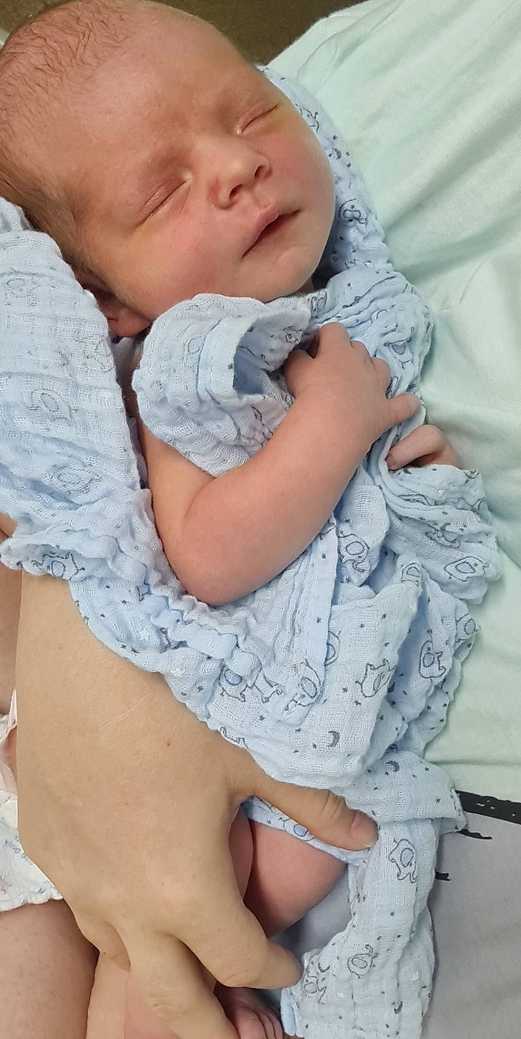 Preston is registered to the contest to win money with this photo: azure, baby, baby_toddler_clothing, cheek, comfort, elbow, facial_expression, finger, gesture, hairstyle, happy, mouth, pattern, person, product, skin, sleeve, textile, thigh, toddler