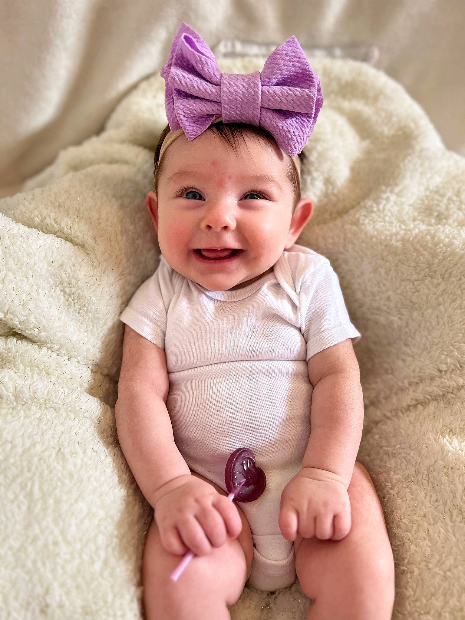 Juliana joined the competition — help win amazing prizes! baby, baby_toddler_clothing, beauty, cap, collar, comfort, foot, happy, headwear, joy, mammal, outerwear, pattern, person, photograph, pink, product, skin, sleeve, smile