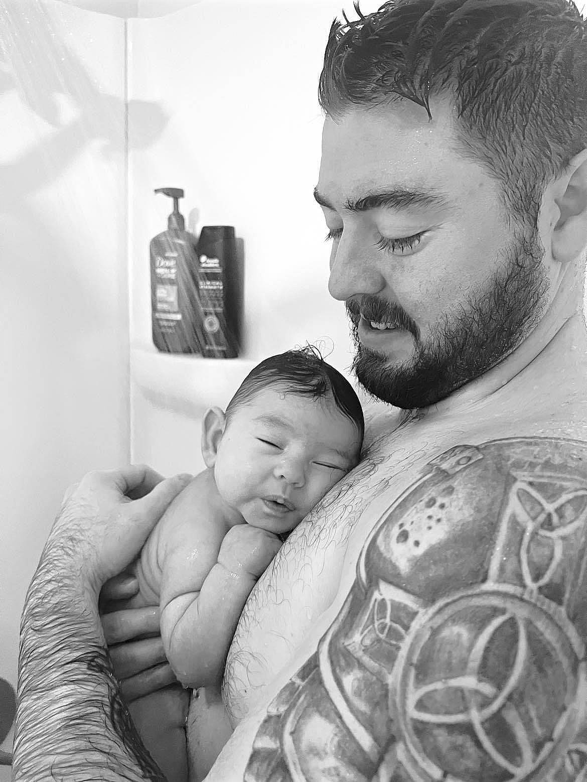 Juliana joined the competition — help win amazing prizes! arm, baby, beard, black_and_white, ear, elbow, eye, eyebrow, gesture, hair, head, mouth, muscle, person, photograph, shoulder, skin, standing, stomach, style