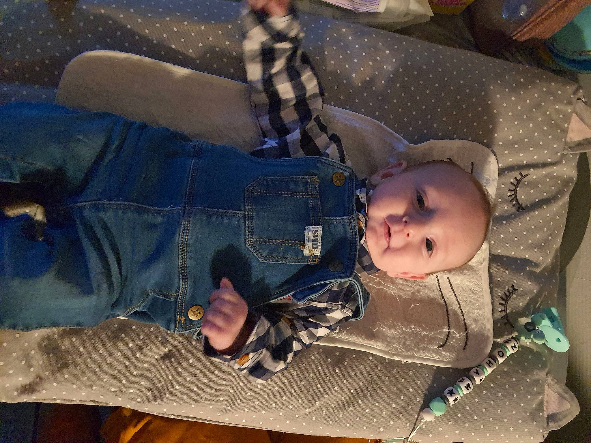 Noham participe au concours pour gagner de l'argent avec cette photo : baby, baby_carriage, baby_products, baby_toddler_clothing, blue, cheek, child, comfort, eye, fun, grass, head, mouth, nap, pattern, person, sitting, skin, textile, toddler