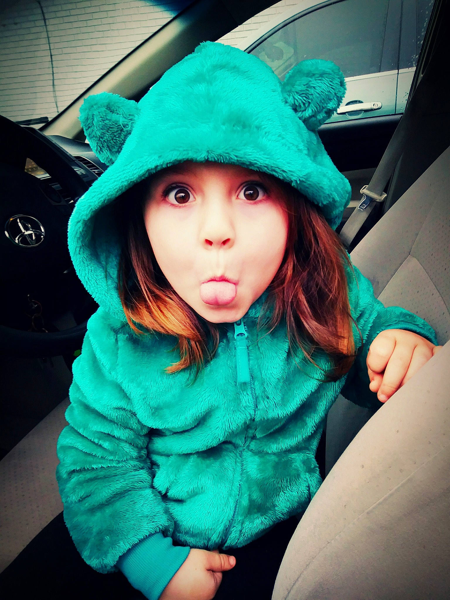 Sopheigh is registered to the contest to win money with this photo: blue, cool, eye, fashion_accessory, fur, green, hat, headgear, lip, outerwear, person, photography, pink, surprise, teal, turquoise