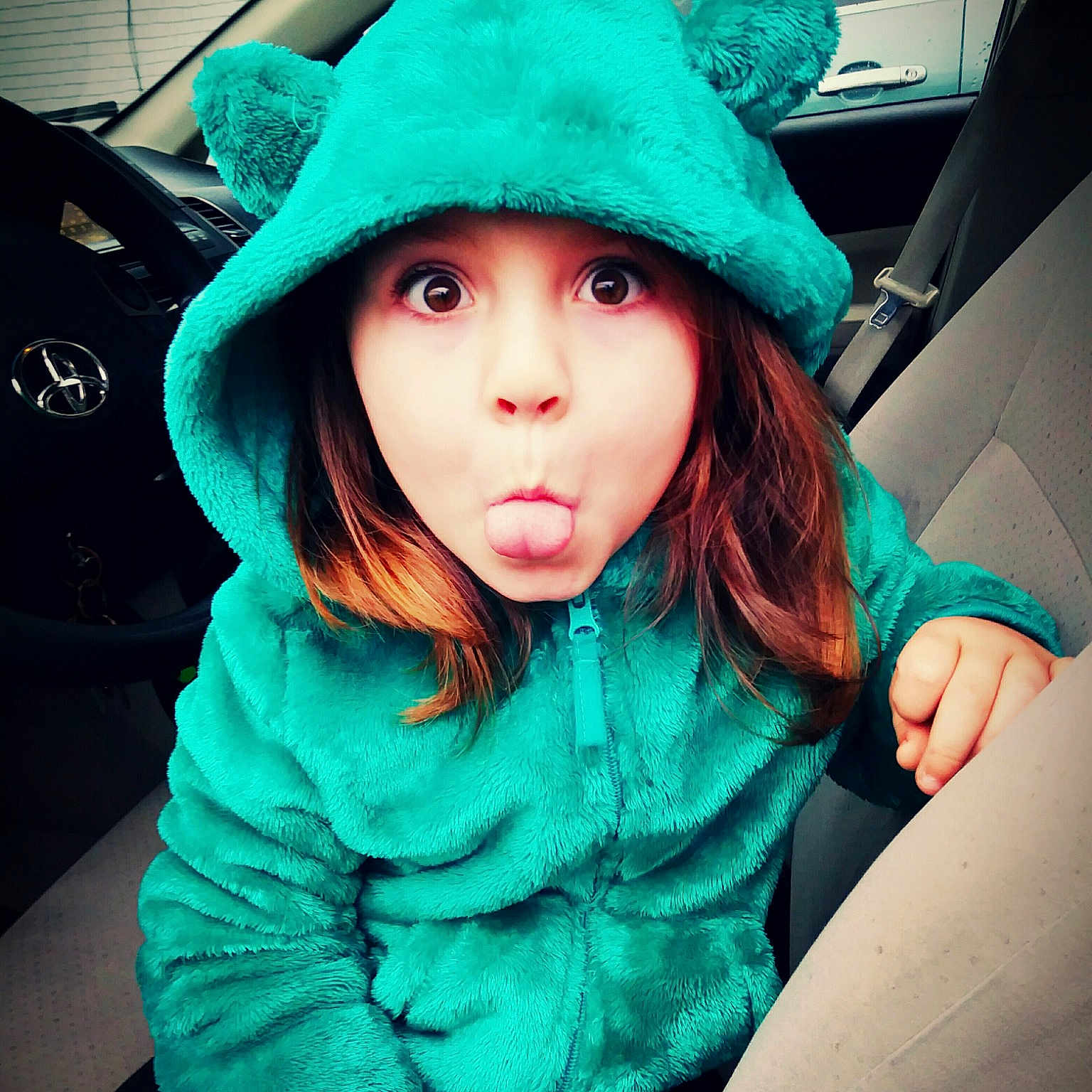 Sopheigh is registered to the contest to win money with this photo: blue, cool, eye, fashion_accessory, fur, green, hat, headgear, lip, outerwear, person, photography, pink, surprise, teal, turquoise