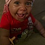 Naziyah joined the competition — help win amazing prizes! baby, smiling, head_wrap, red_shirt, crawling, happy, indoors, closeup, child, cute, infant, person, face, expression, hand, pacifier_clip, bright_eyes, skin, tongue_out, toddler