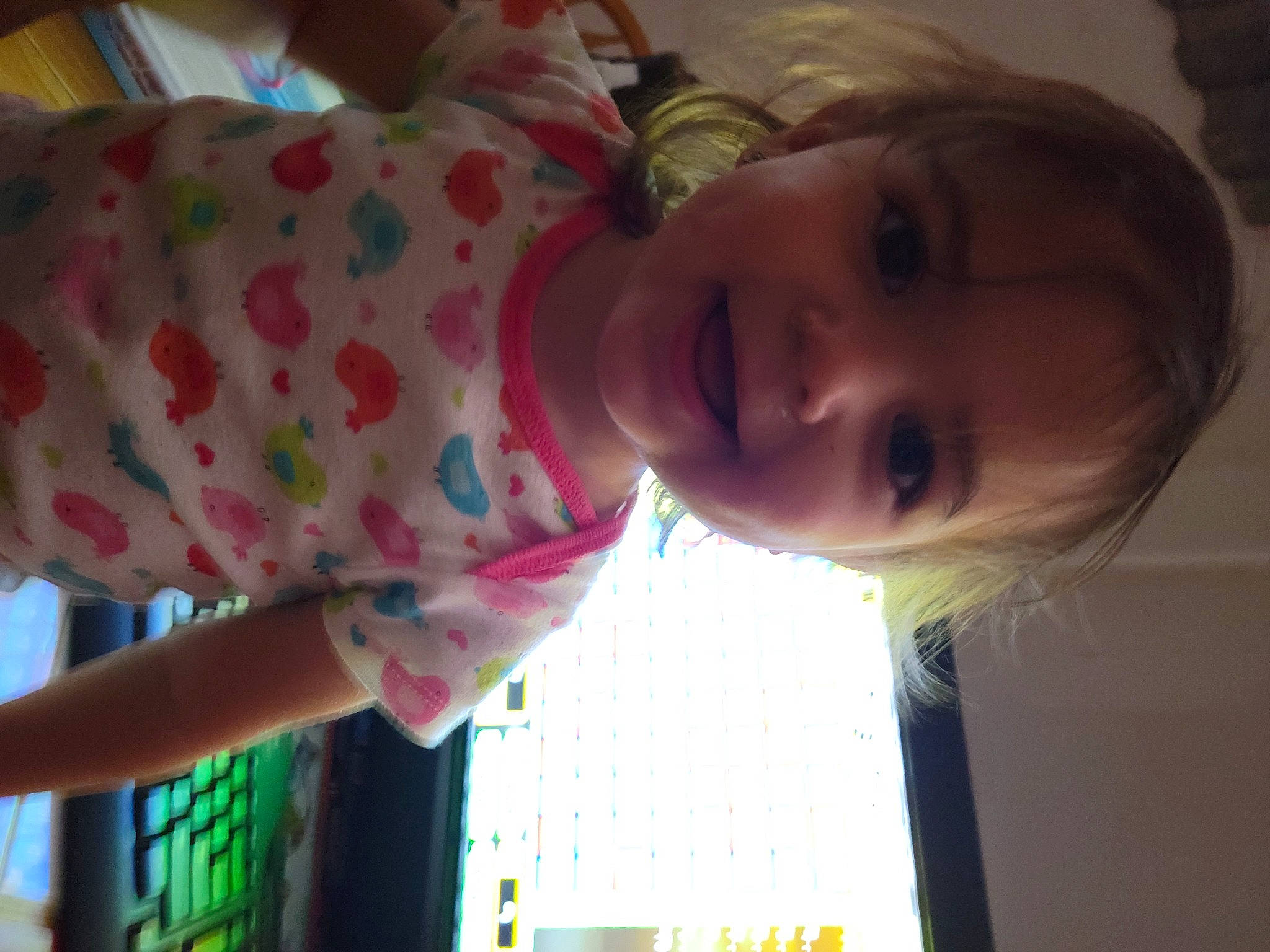 Kairi is registered to the contest to win money with this photo: cheek, child, eyelash, facial_expression, finger, fun, green, happy, iris, joy, lip, mouth, nose, organ, person, pink, plant, skin, smile, toddler