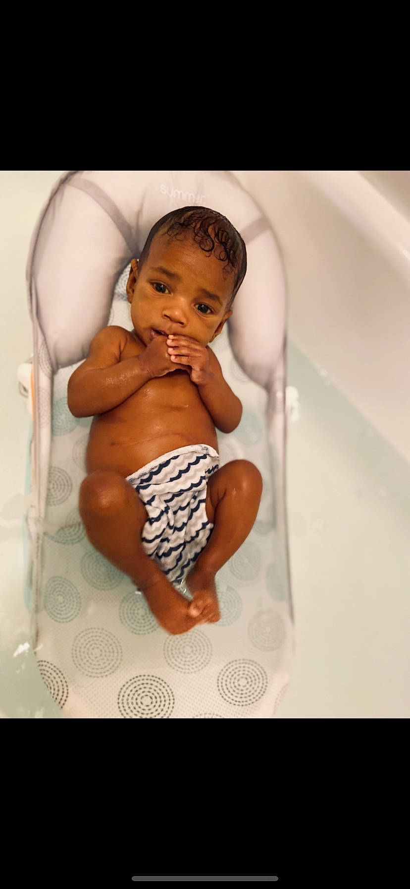 Danthony is registered to the contest to win money with this photo: abdomen, arm, baby, bathing, bathroom, bathtub, cheek, chest, elbow, finger, fluid, hand, human_body, human_leg, liquid, person, stomach, thigh, thumb, toddler