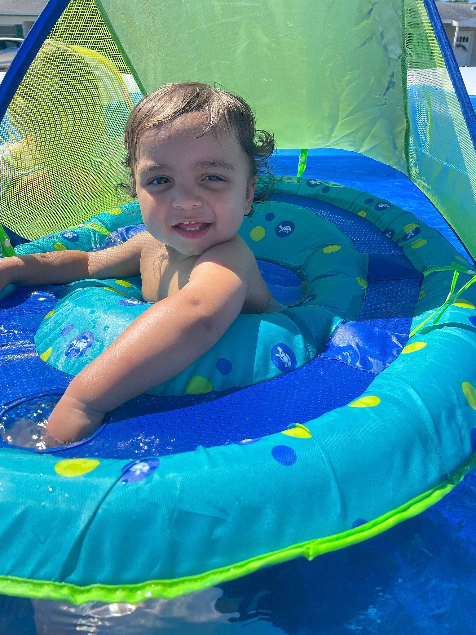 Junior joined the competition — help win amazing prizes! aqua, azure, beauty, blue, child, electric_blue, fun, games, grass, green, happy, inflatable, joy, leisure, nature, person, plant, play, product, recreation