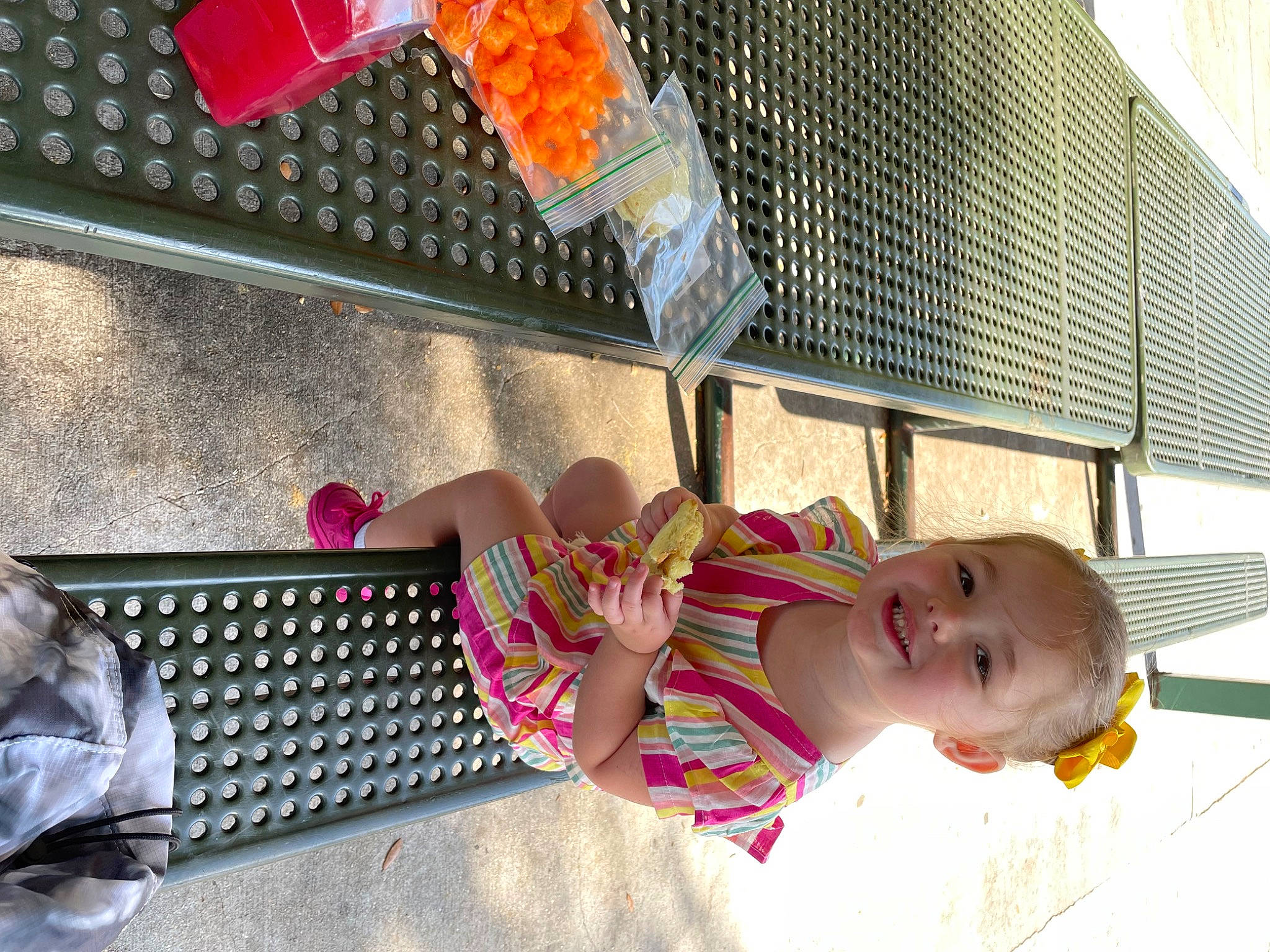 Mia is registered to the contest to win money with this photo: auto_part, automotive_exterior, baby, baby_products, baby_toddler_clothing, bumper, child, fun, hat, human_leg, joy, leisure, pattern, person, room, sandal, smile, thigh, toddler, toy