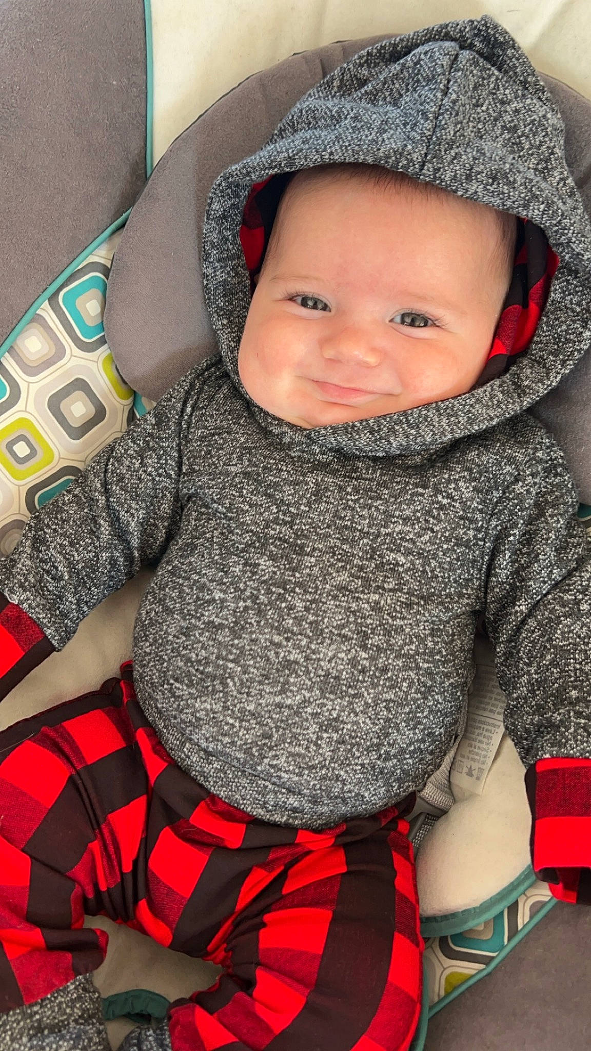 Bentley joined the competition — help win amazing prizes! arm, baby_toddler_clothing, black, cheek, comfort, cool, eye, face, hand, happy, outerwear, person, product, red, skin, sleeve, smile, tartan, textile, toddler