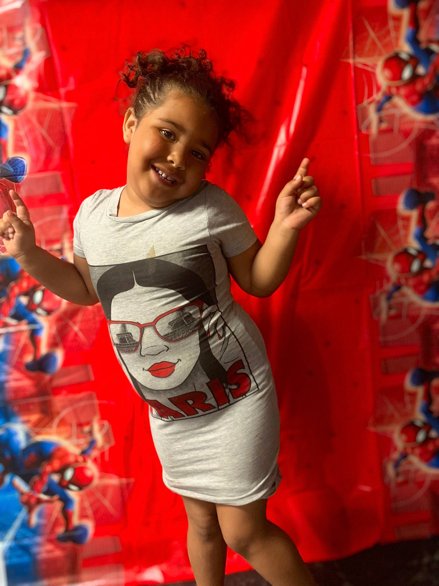 Aubrionna is registered to the contest to win money with this photo: entertainment, event, fashion_design, flash_photography, fun, gesture, happy, human_body, human_leg, joy, leisure, magenta, orange, pattern, person, red, sleeve, smile, t_shirt, thigh