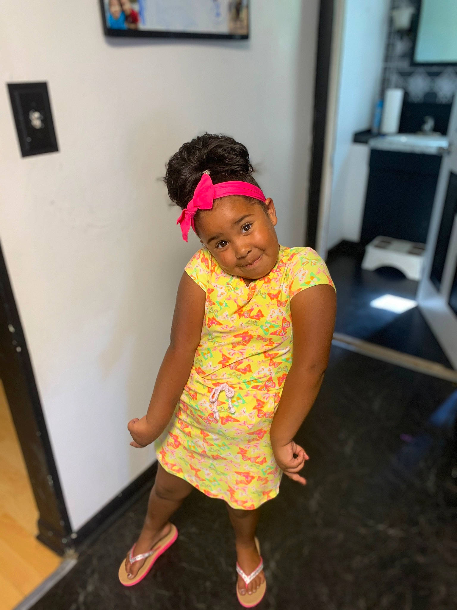 Aubrionna is registered to the contest to win money with this photo: baby_toddler_clothing, cap, child, door, event, face, facial_expression, fashion_accessory, fashion_design, flooring, fun, happy, headwear, joy, magenta, pattern, person, picture_frame, sandal, shoulder