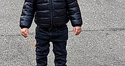 Tyler joined the competition — help win amazing prizes! black_jacket, casual_clothing, child, cold_weather, fashion, footwear, hoodie, jacket, outdoor, pants, pavement, person, serious_expression, sidewalk, sneakers, standing, street, toddler, urban, young_child