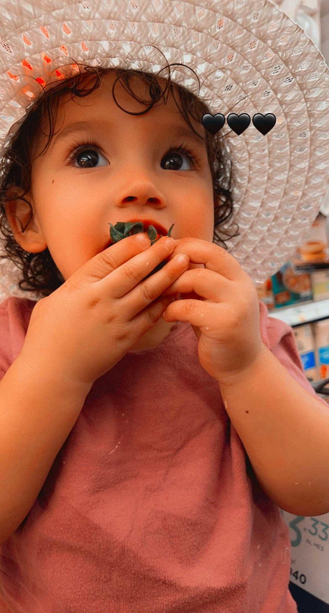 Isabella is registered to the contest to win money with this photo: baby, cheek, chin, eyebrow, eyelash, face, finger, fun, gesture, hand, happy, headwear, iris, lip, mouth, neck, nose, person, pink, skin