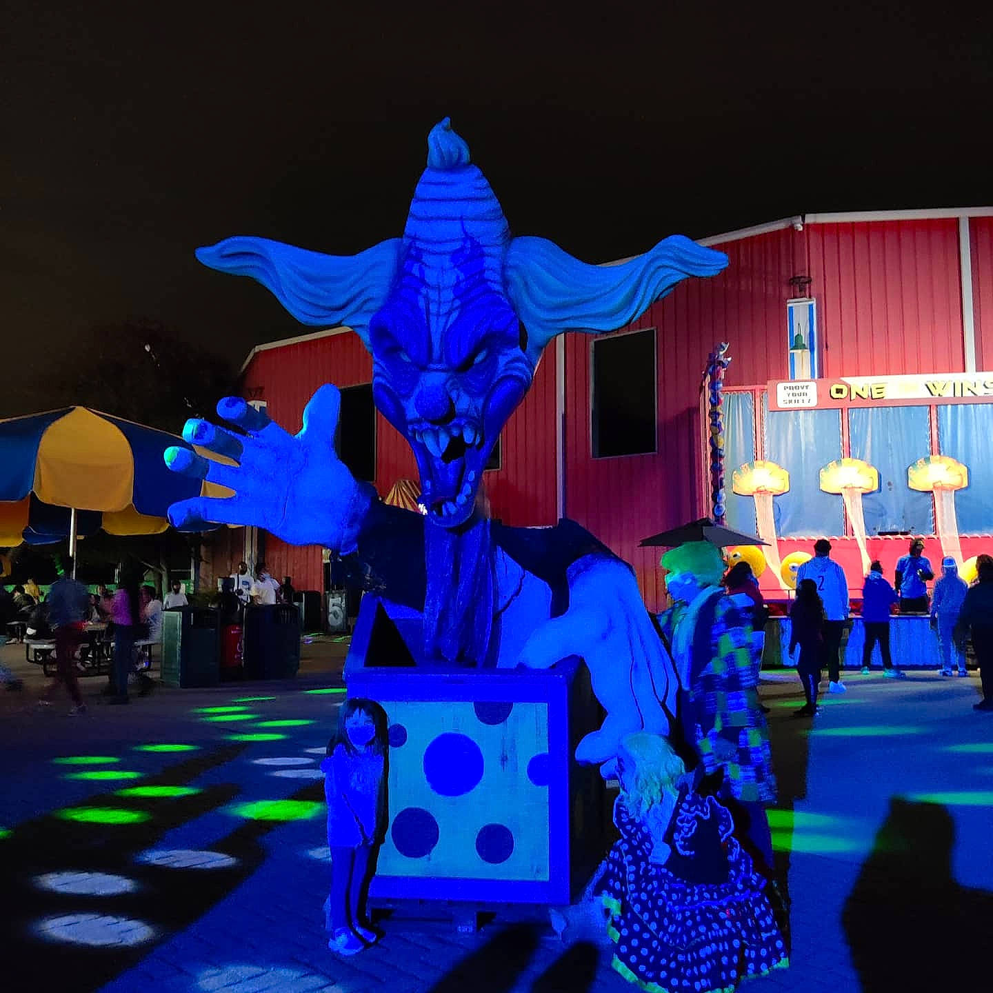 Kendall is registered to the contest to win money with this photo: animation, art, blue, city, design, electric_blue, electricity, entertainment, event, fictional_character, fun, leisure, magenta, performance_art, performing_arts, person, purple, recreation, under_exposed, visual_arts