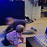 Kendall is registered to the contest to win money with this photo: baby, bag, blue, child, electric_blue, floor, flooring, fun, leisure, light, luggage_and_bags, magenta, product, purple, room, sneakers, sportswear, standing, t_shirt, toddler