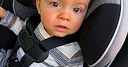 Oliver joined the competition — help win amazing prizes! toddler, child, car_seat, blue_cap, mickey_mouse, seatbelt, striped_shirt, curious, face, headwear, sitting, safety, car_interior, young_child, portrait, clothing, casual, daylight, baby, kid